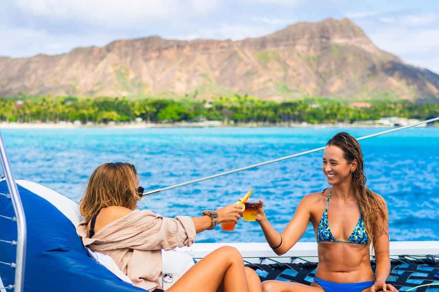 Board from Waikiki Beach for our Aloha Hour Sail - Aloha Hour Drinks Included in the Fare