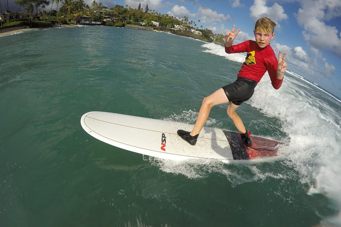 Family, Private & Group Surfing Lessons, Waikiki Courtesy Shuttle - Riding to the beach with a board and instructor