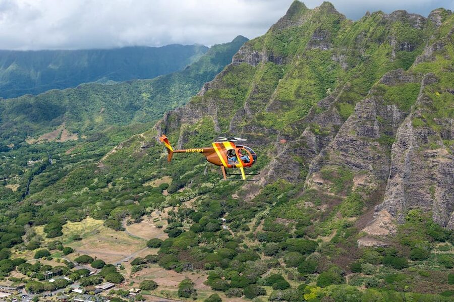 Oahu: Magnum P.I. Doors-Off Helicopter Tour - Waikiki from an open helicopter
