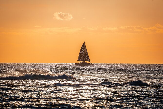 Oahu's Waikiki Coast: Moana’s Sunset Cocktail Sail - Watching the sun set from the catamaran