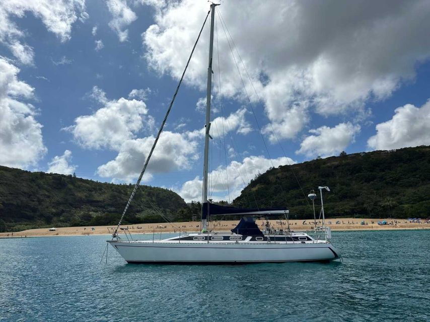 Oahu: Sunset sailing in small intimate groups - The first view of Diamond Head from the sea