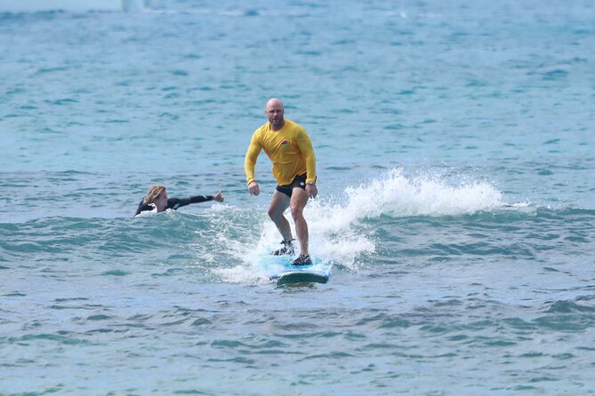 Open Group Surfing Lesson in Waikiki, Hawaii - Your first paddle, turn, and stand-up