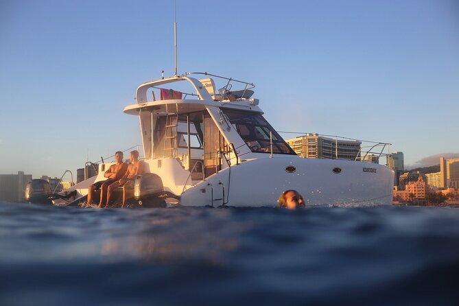 Private Catamaran Cruise and Snorkeling Tour in Honolulu - Cruising offshore with Diamond Head in view