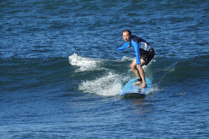 Private Surfing Lessons on the North Shore of Oahu - Practicing the pop-up on dry land