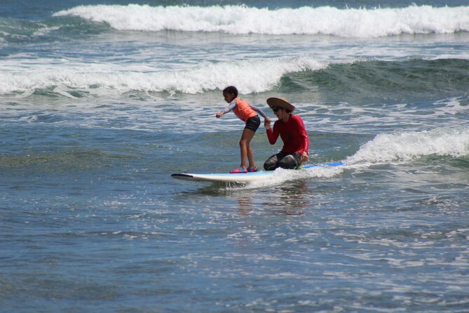 Surf Lessons on the North Shore of Oahu - Looking for turtles in warm North Shore water