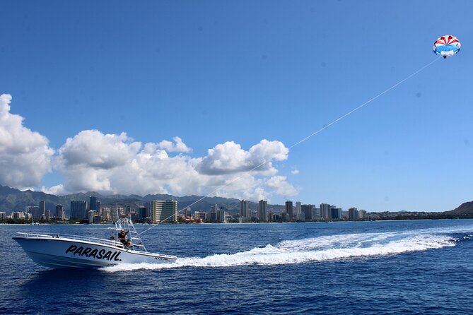 Waikiki and Diamond Head Parasailing Experience - The crew, music, and boat atmosphere
