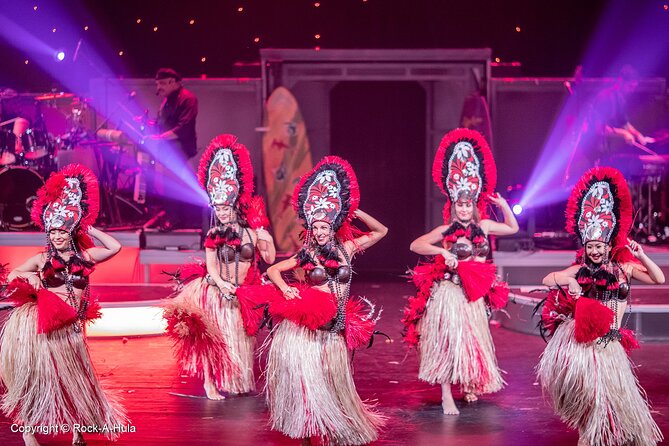 Waikiki Luau Buffet with Optional Rock-A-Hula Show Ticket - Hula, fire knives, and the Rock-A-Hula stage